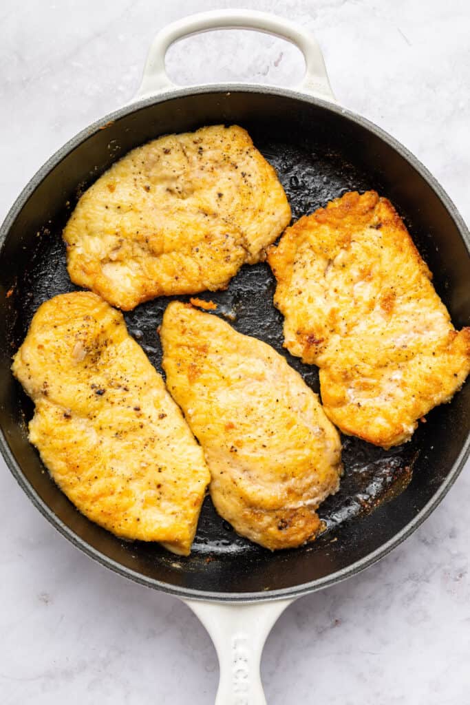 Cooking chicken cutlets in skillet