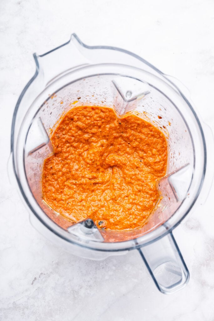Overhead view of romesco sauce in blender