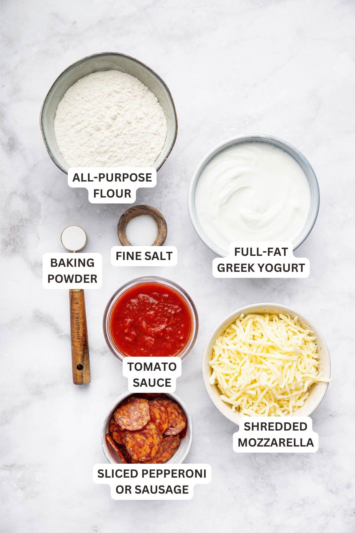 This Protein Pizza Crust is crisp and delicious, with Greek yogurt for a protein boost! Add your favorite toppings for a satisfying meal. Overhead view of protein pizza crust ingredients and toppings