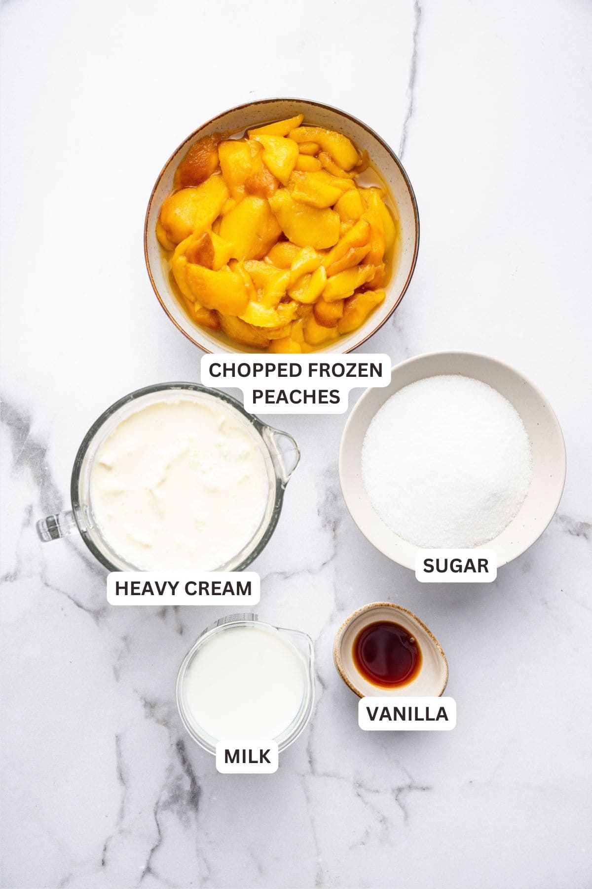 Overhead view of ingredients for peach ice cream