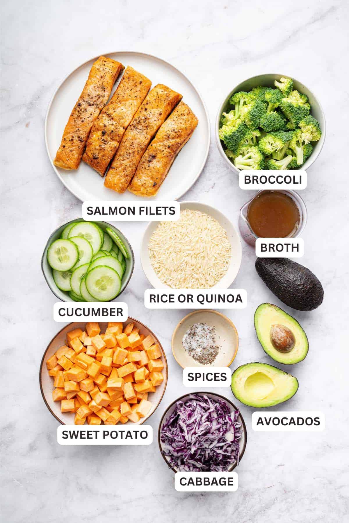 With flaky salmon, grains and veggies, this Salmon Power Bowl recipe is an easy meal prep option that will fuel you through your day! Overhead view of ingredients for salmon power bowl