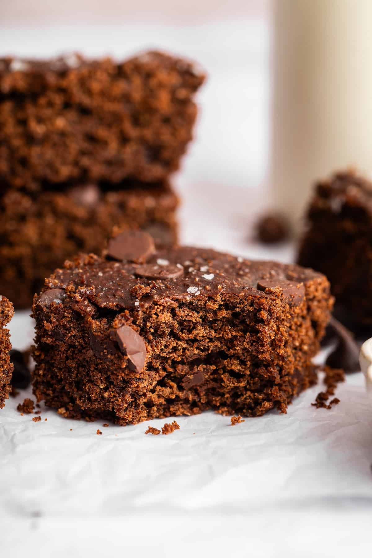 Bite taken out of cottage cheese brownie.