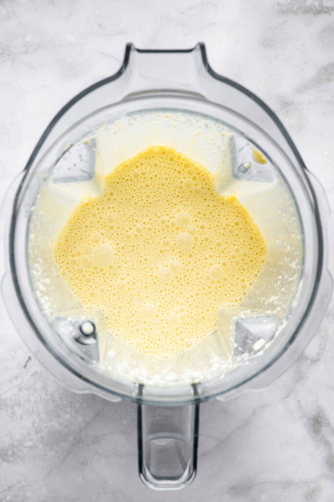 These easy Cottage Cheese Brownies are the perfect wholesome indulgence, with extra protein and whole grains in a rich, fudgy brownie! Wet ingredients for cottage cheese brownies in blender.