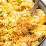 Spoonful of cottage cheese egg salad in bowl.