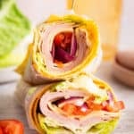 Cottage cheese wraps filled with veggies, cheese, and lunchmeat.