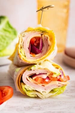 Cottage cheese wraps filled with veggies, cheese, and lunchmeat.