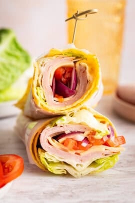 Cottage cheese wraps filled with veggies, cheese, and lunchmeat.