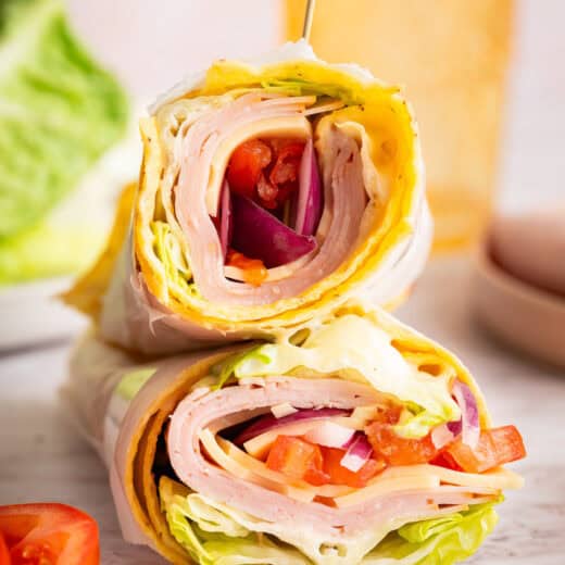 Cottage cheese wraps filled with veggies, cheese, and lunchmeat.