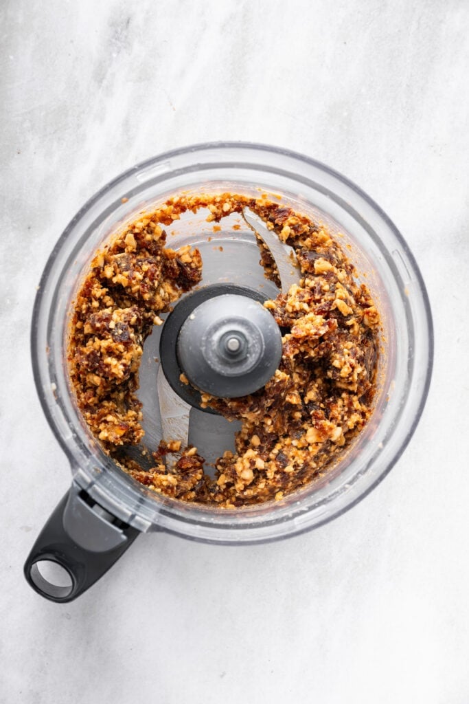 Nuts and dates ground in food processor.