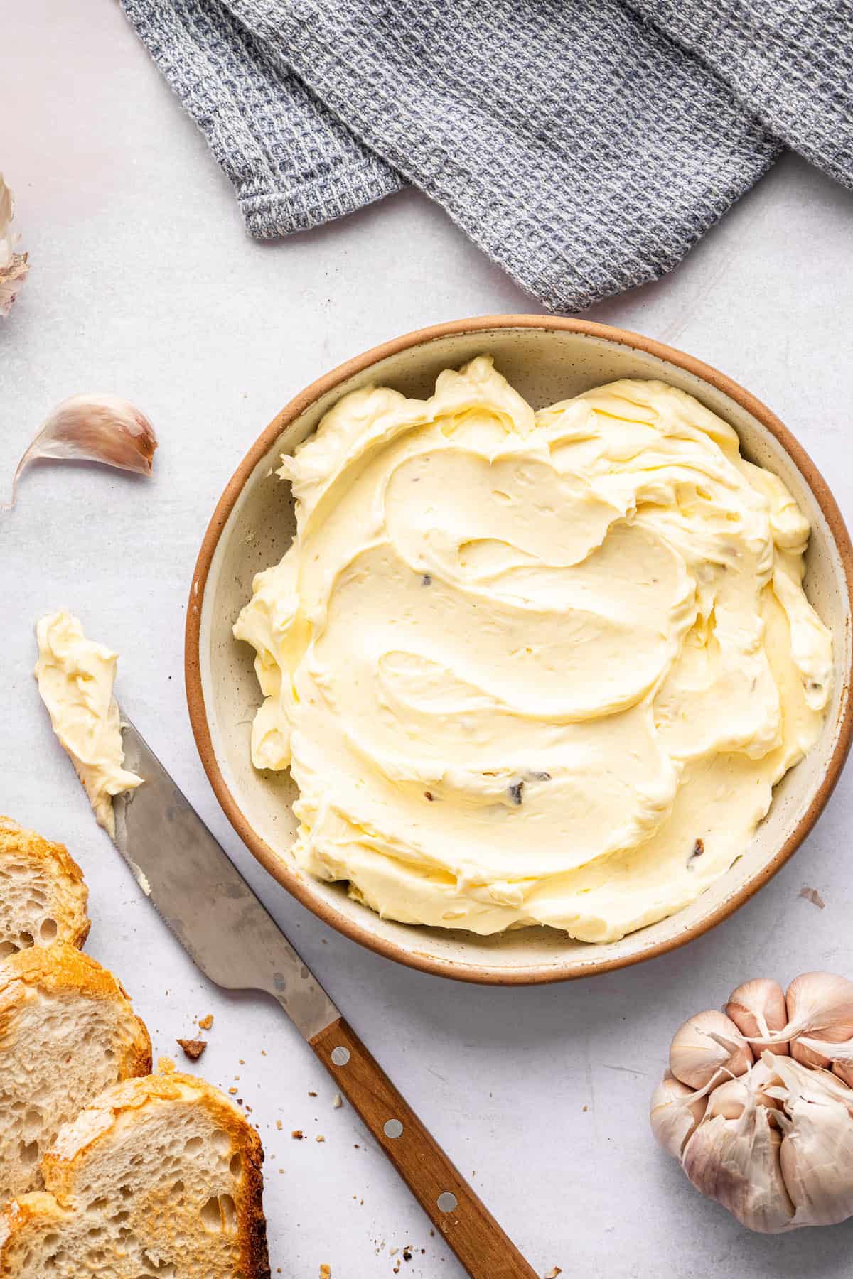 This roasted garlic butter recipe is one of the easiest ways to make just about anything taste even better. You only need 2 ingredients! Bowl of homemade garlic butter.