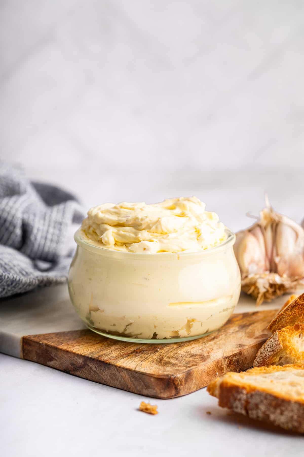 This roasted garlic butter recipe is one of the easiest ways to make just about anything taste even better. You only need 2 ingredients! Roasted garlic butter in glass jar.