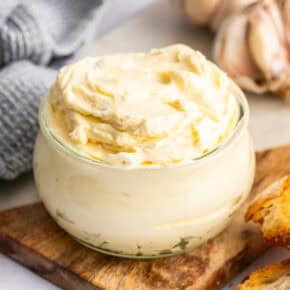 Jar of homemade roasted garlic butter.