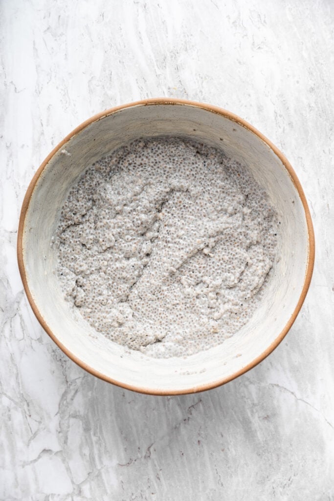 Thickened chia pudding ready to be divvied up into smaller jars.