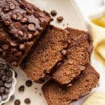 Sliced chocolate zucchini bread on a plate.