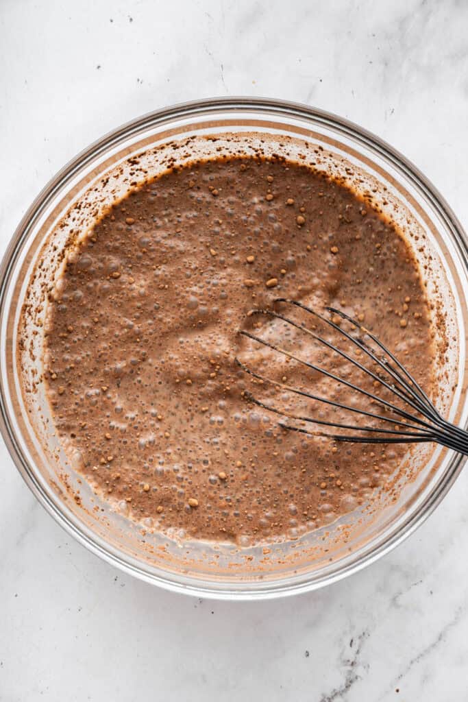 This creamy 5-ingredient chocolate chia pudding packs a powerful punch of protein and just-sweet-enough chocolate pizzaz. And it's so easy! Whisking together chia seeds, hemp seeds, cocoa powder, almond milk, and water.